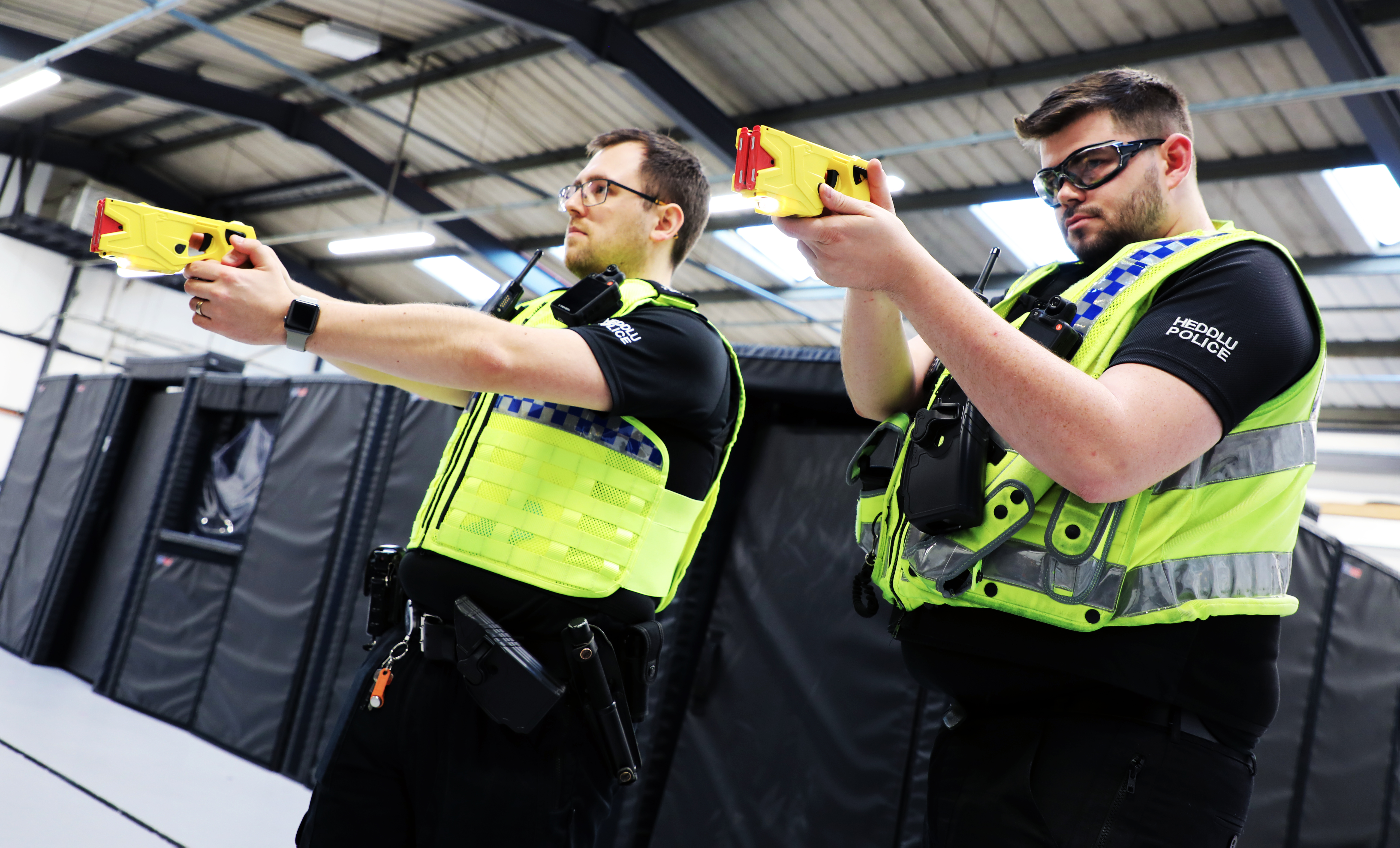 A Special Constable holding a Taser during training